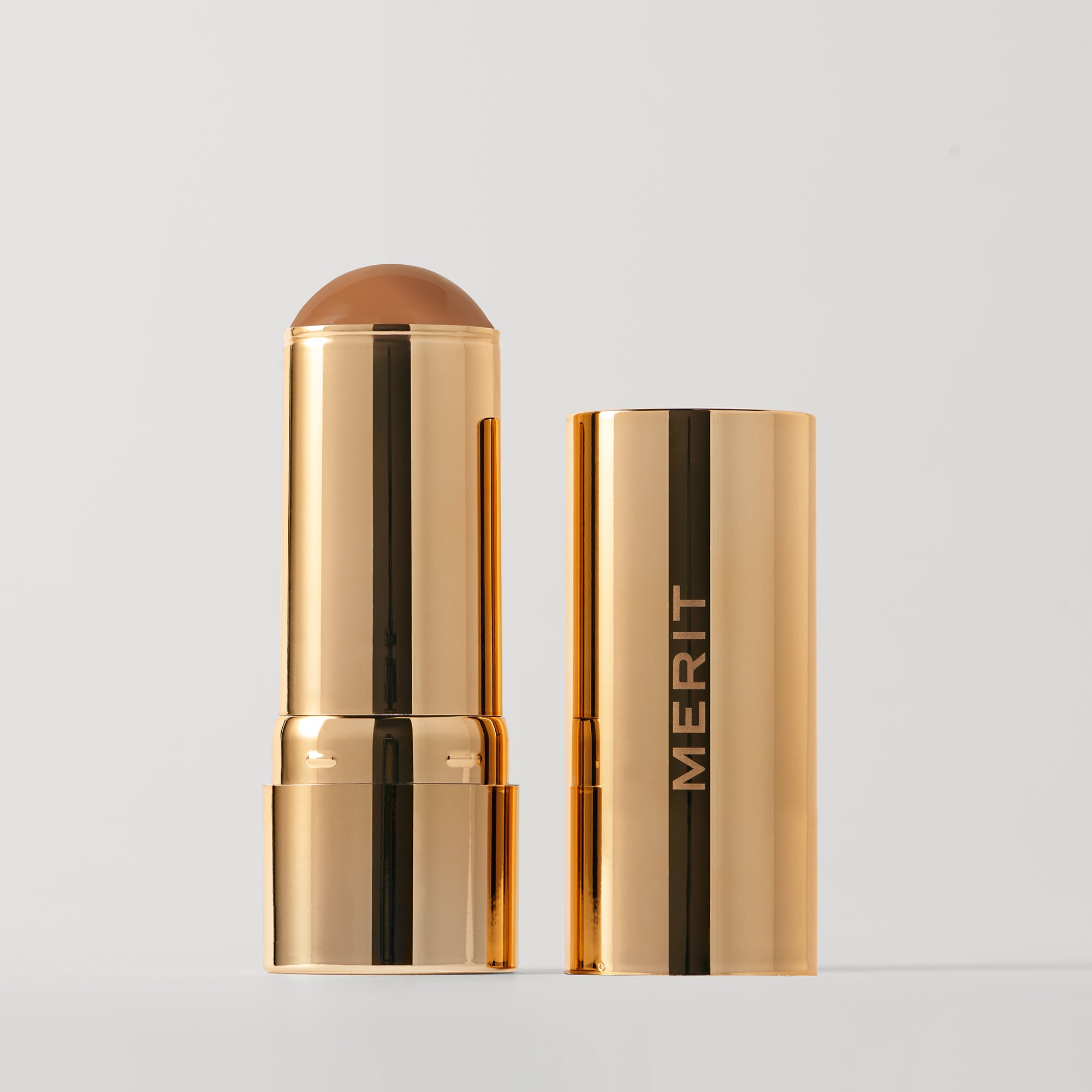 MERIT-BronzerBalm-Clay_cdca974a-a4bc-44c0-948d-16e6f3182c86.jpg